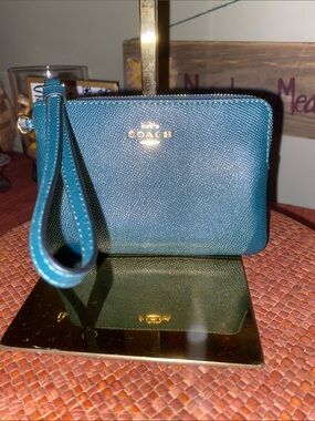 Coach Small Corner Zip Wristlet in a stunning Dark Teal (Green) color.